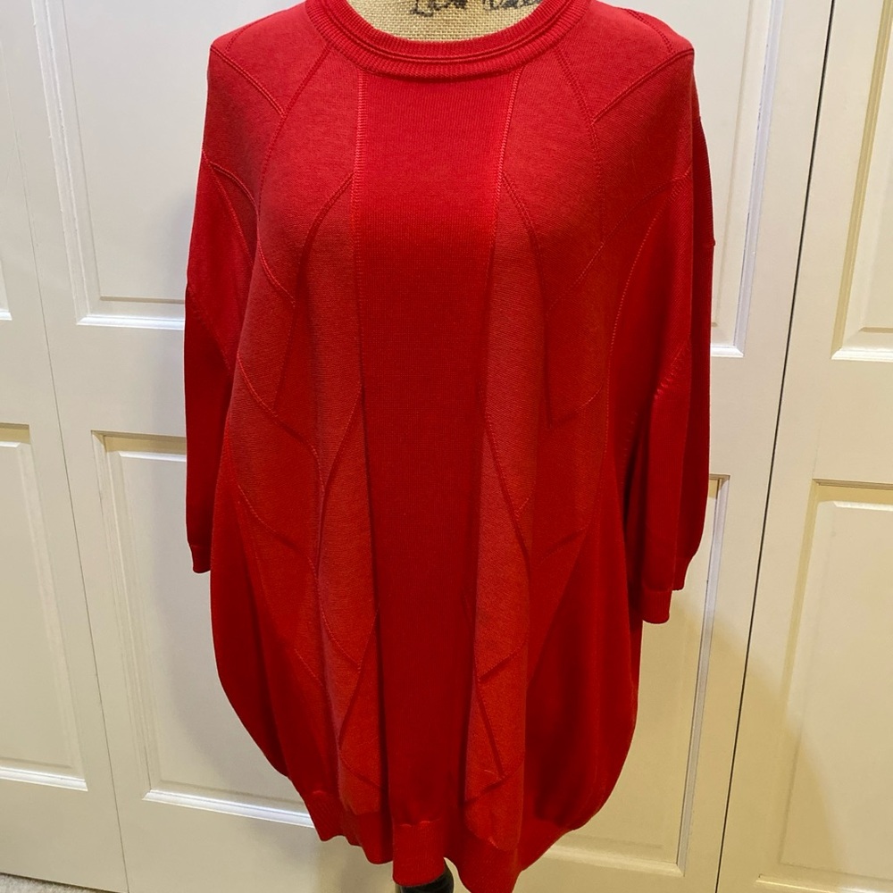 Rayon/Cotton blend. Beautiful red Men’s light weight sweater.